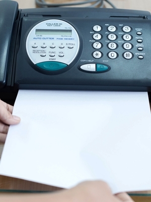 Man walks into traffic, files suit over fax machine